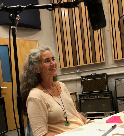 Anne Newgarden seated in a recording studio