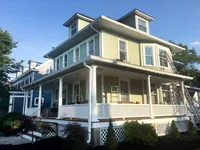Exterior of Commonplace Reader bookstore in a Victorian house in Yardley, Pennsylvania