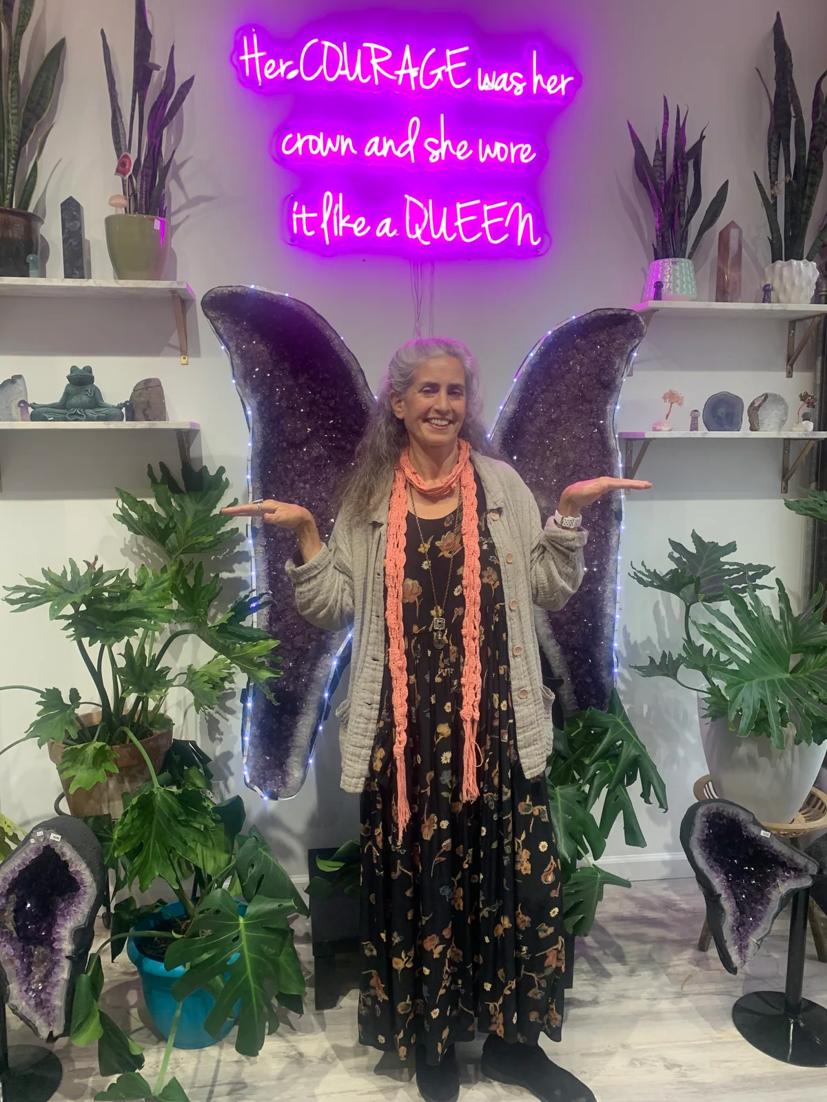 Anne Newgarden standing between amethyst wings at Freedom Rocks