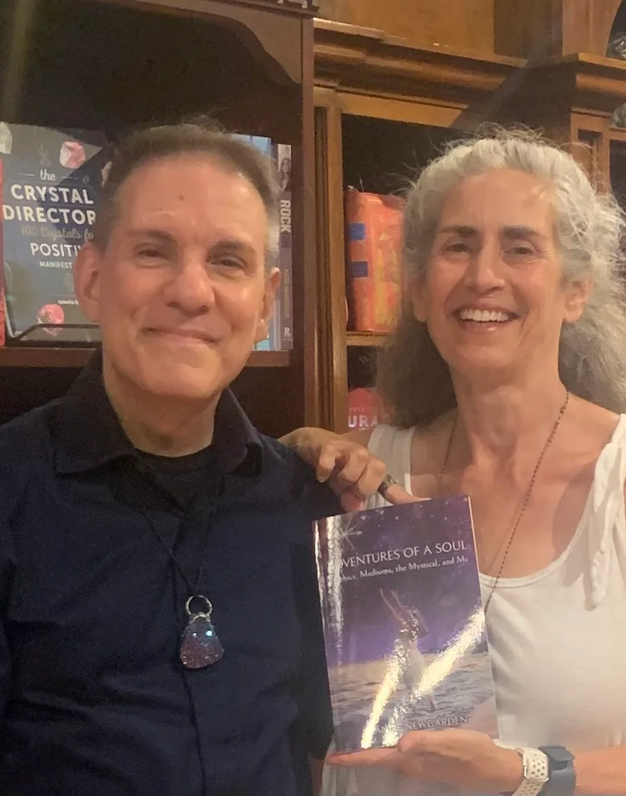 Edward Ragosta and Anne Newgarden smiling together at LightClub Curiosity Shoppe