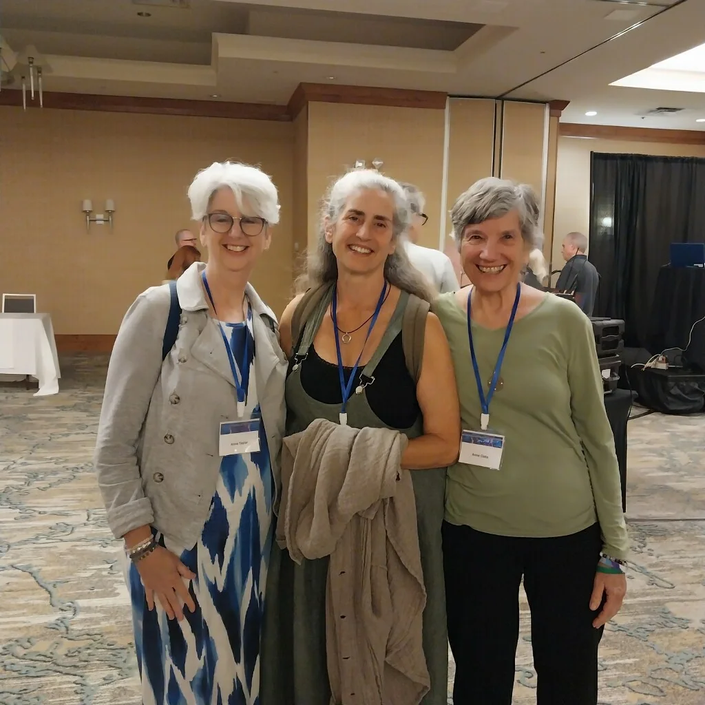Anne Newgarden standing with two fellow attendees at the Rochester event