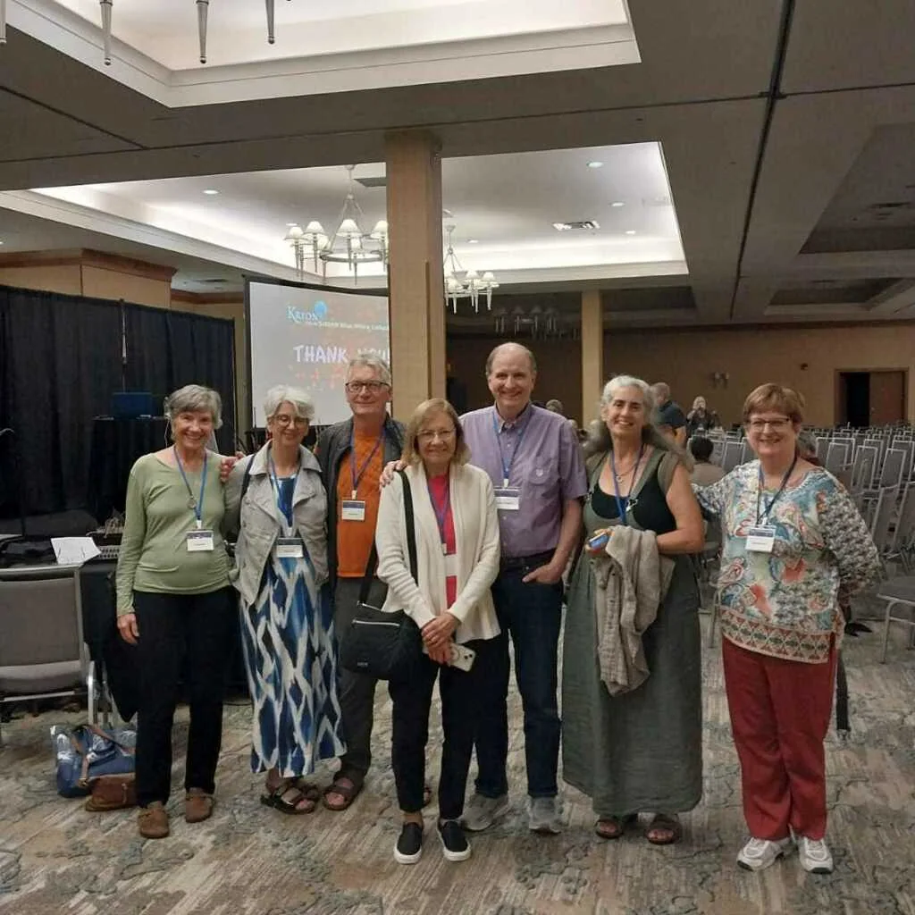 A group of attendees posing at the Rochester channeling event